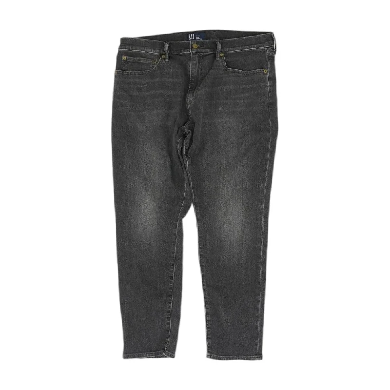 Men's Pants with Hidden ButtonsBlack Solid Slim Jeans