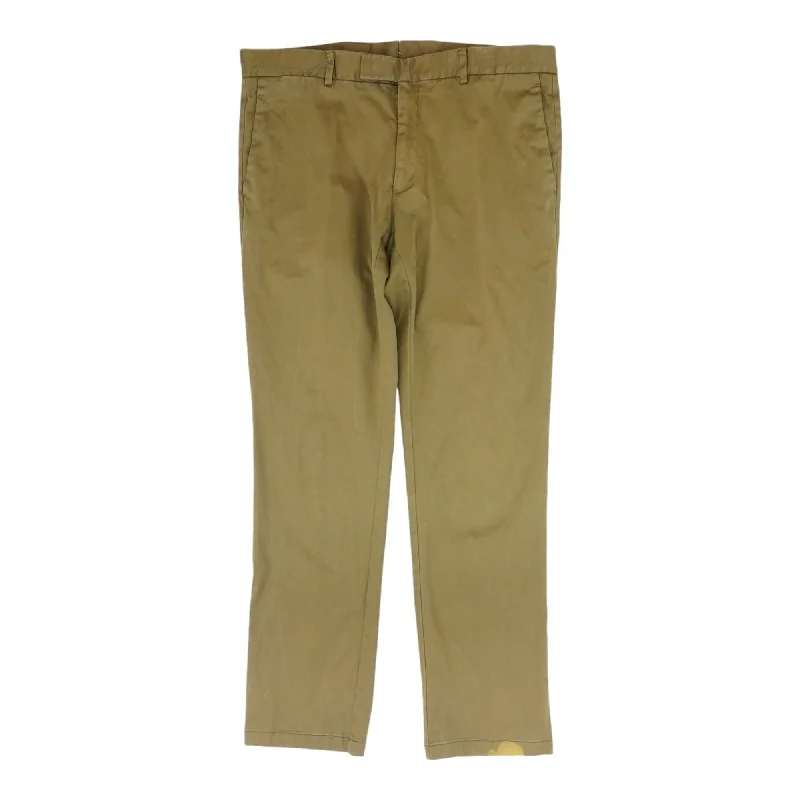 Men's Pants with Logo EmbossmentsBrown Solid Chino Pants