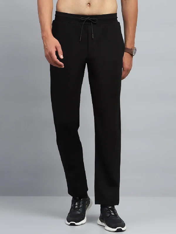 Men's Patterned Pants with Animal PrintsMen Black Solid Regular Fit Lower
